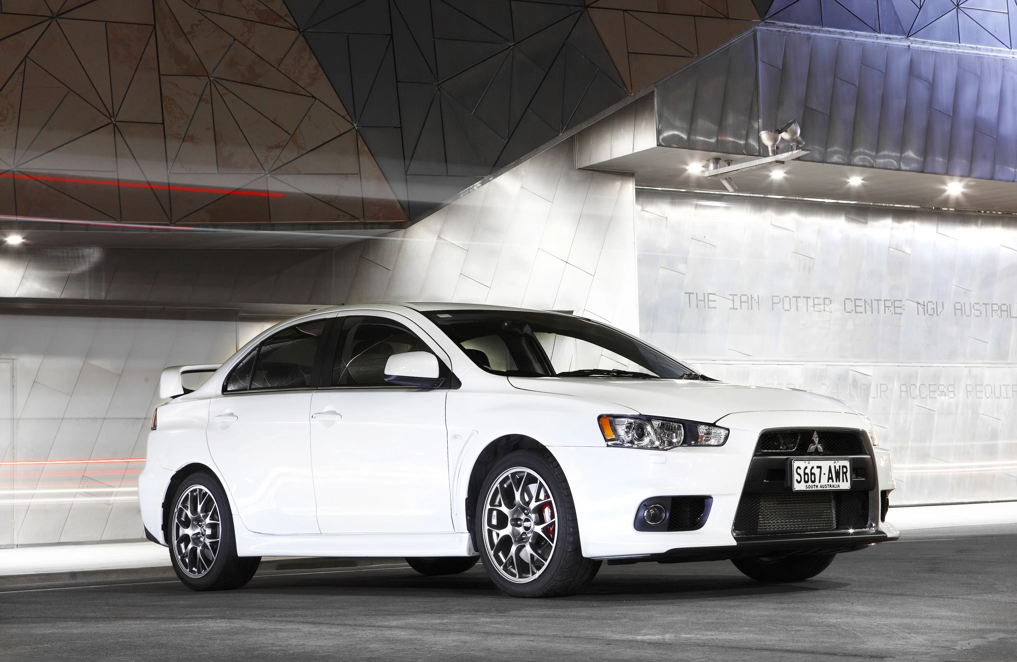 MITSUBISHI-Lancer-Evolution-X-3769_128-1.jpeg